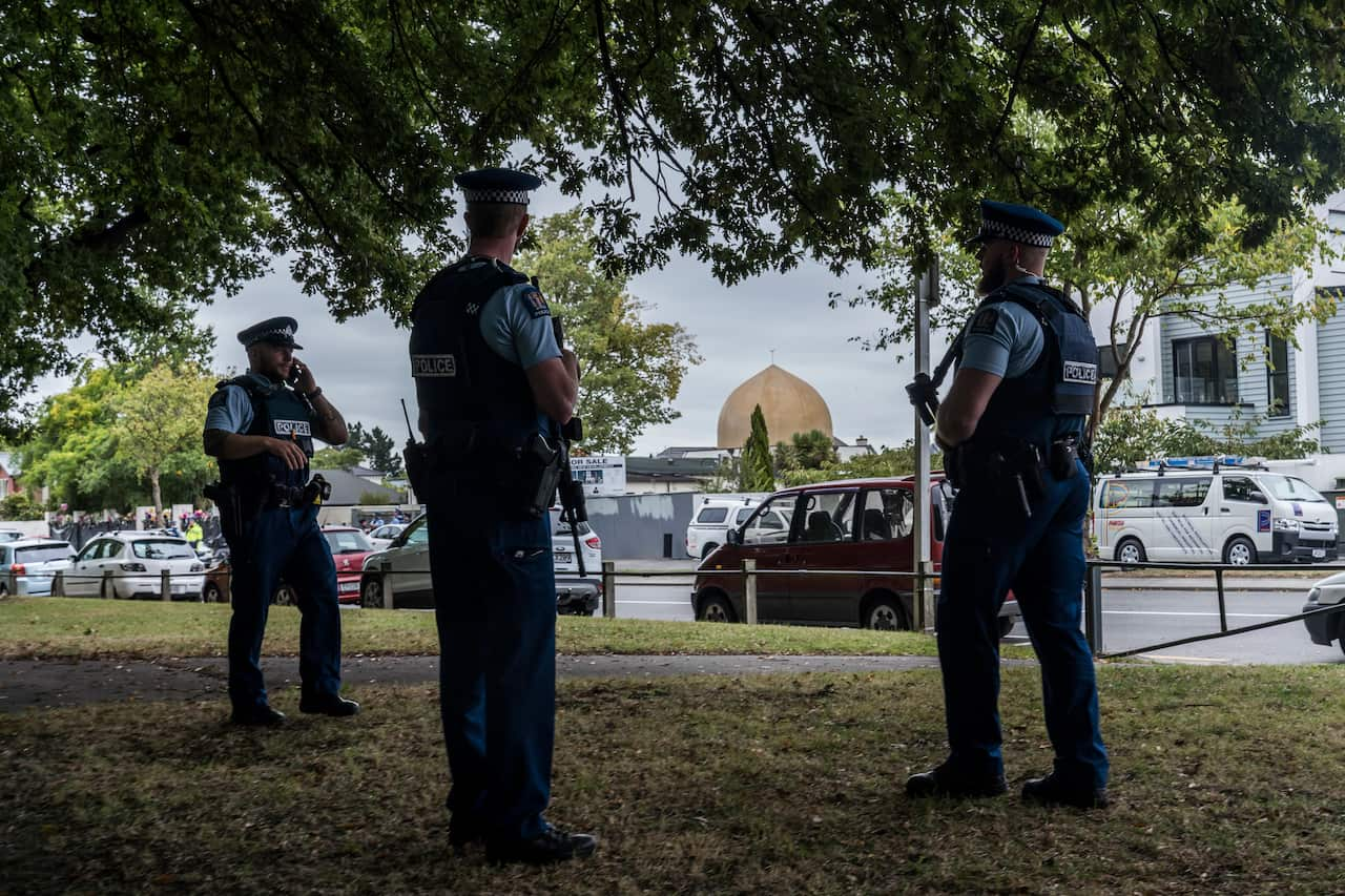 Police officers near the Al Noor Mosque in the days after it was attacked in Christchurch, New Zealand.