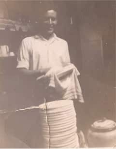 Nicholas Kondelos working as a dish hand when he first arrived in Australia. (Supplied)