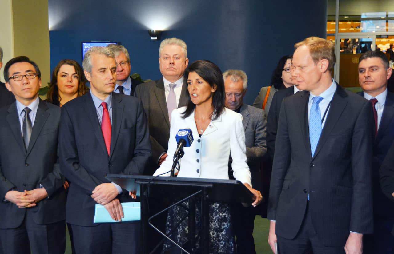 U.S. Ambassador to the UN Nikki Haley with representatives of about 20 other nations, speaks against a treaty outlawing nuclear weapons, in New York.