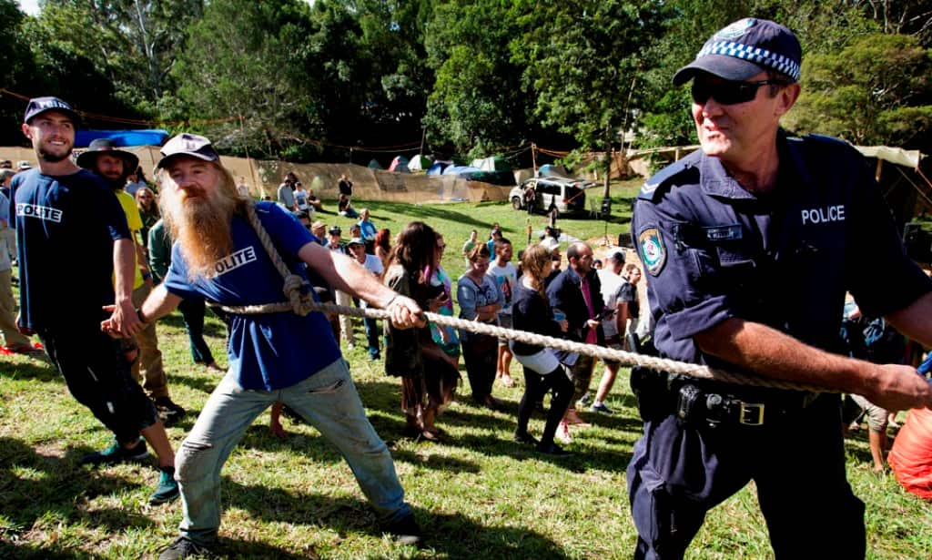 Polite verses police in the Tug of Peace, Nimbin. Every year, stoners battle the authorities pulling opposite ends of a hemp rope, symbolic of  the fight for cannabis law reform.