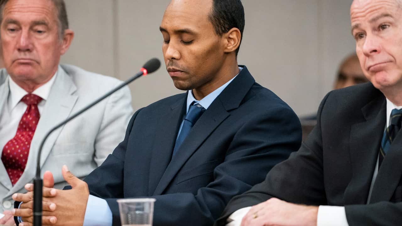 Mohamed Noor listens to victim impact statements during his sentencing hearing.