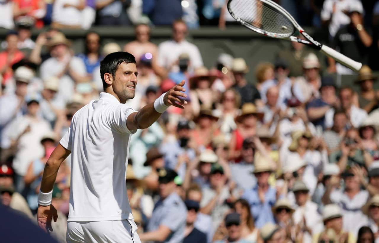  Novak Djokovic of Serbia celebrates after beating Kevin Anderson of South Africa in the men's singles final