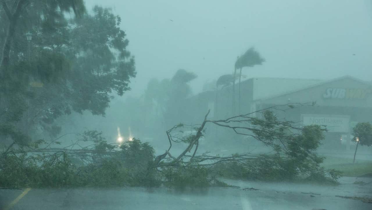 Winds create destruction as Tropical Cyclone Marcus bears down on Darwin on March 17, 2018.