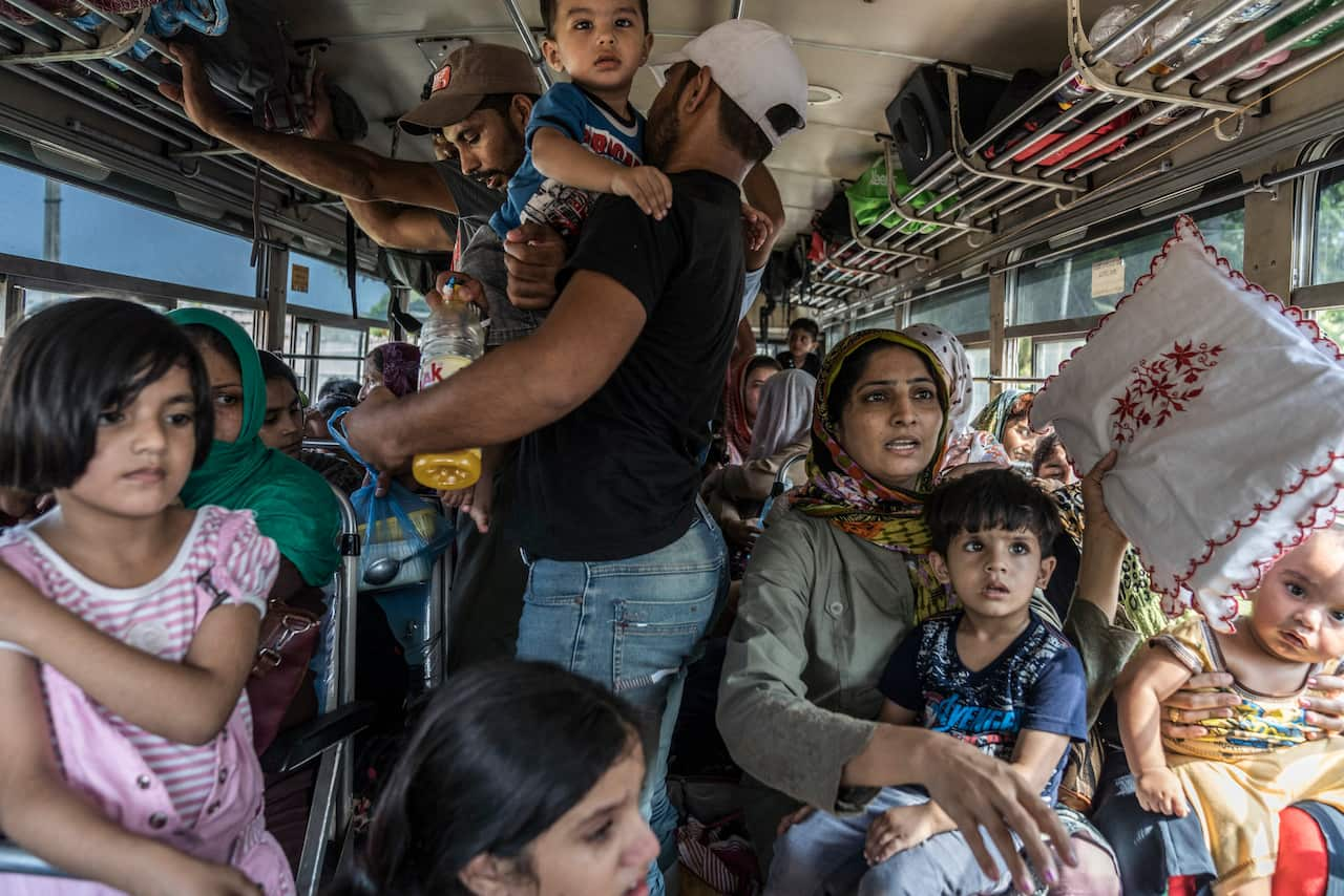 Muslims from Negombo being relocated to another town.