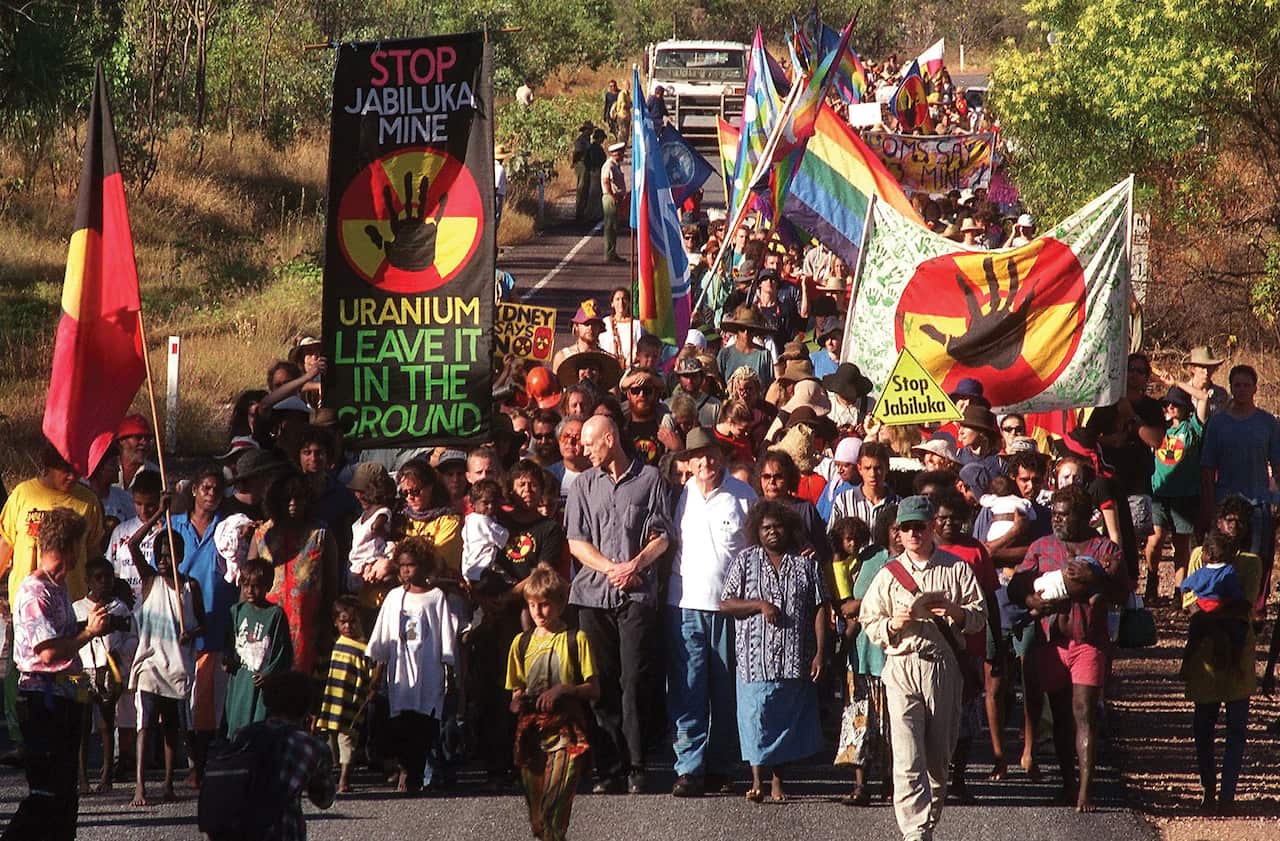 Jacqui Katona, Peter Garrett, Tom Uren and Yvonne Margarula lead the Jabiluka blockade march in 1998.Kakadu National Park.
