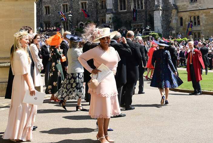 Oprah Winfrey leaves St George's Chapel at Windsor Castle after the wedding of Meghan Markle and Prince Harry. 