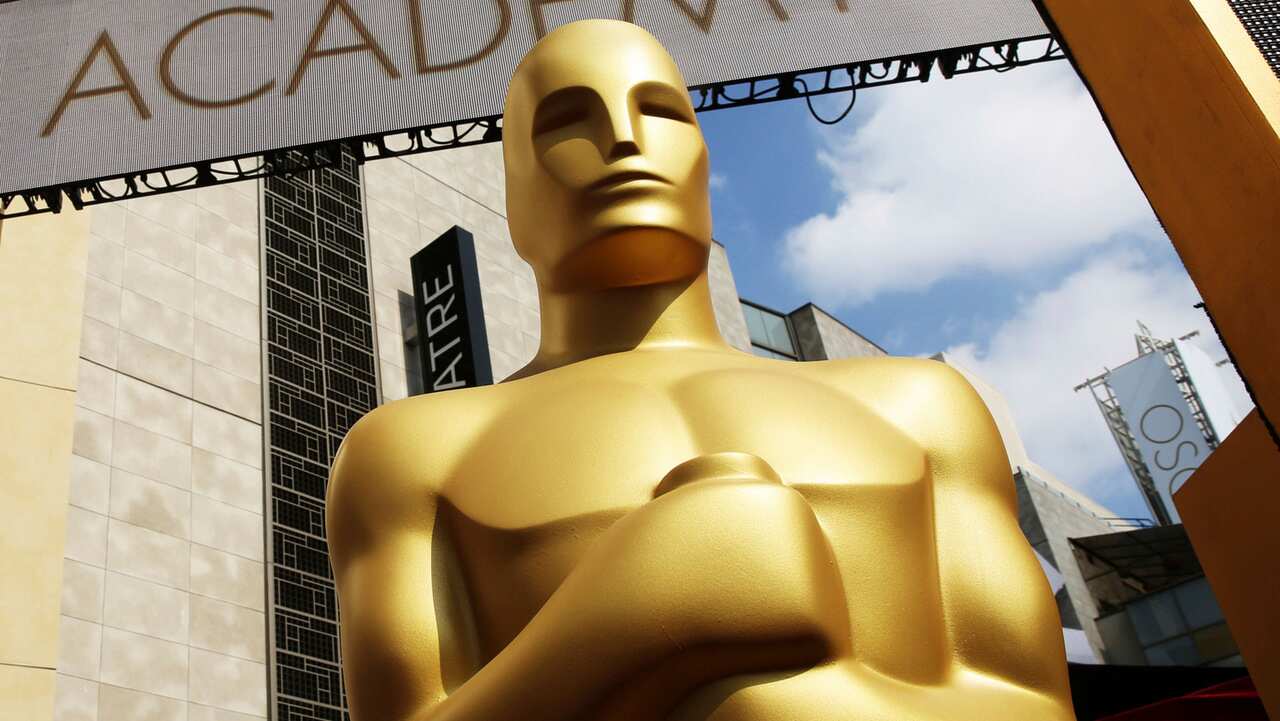 An Oscar statue appears outside the Dolby Theatre for the 87th Academy Awards in Los Angeles.  