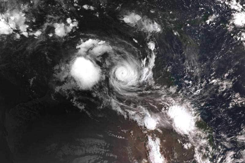 Cyclone Owen was downgraded to a category two after crossing the Queensland coast.
