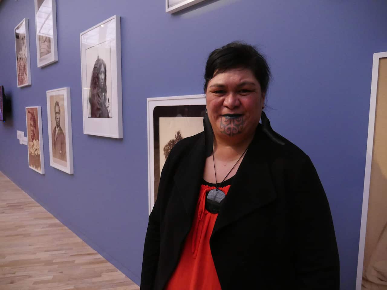 Nanaia Mahuta at the Māori Markings: Tā Moko exhibit. She is the first minister to wear a moko kauae (a traditional facial tattoo worn by Māori women).