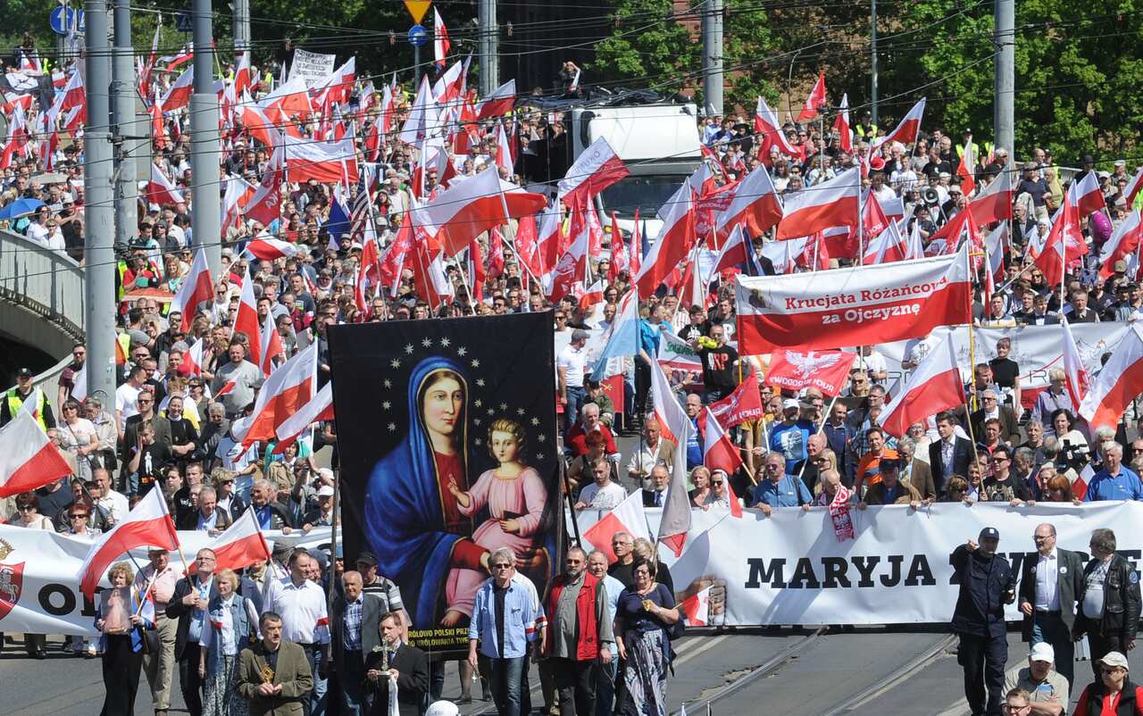 Nationalist and Catholic activists march through the downtown in a protest against the European Union, in Warsaw, Poland, Saturday, May 7
