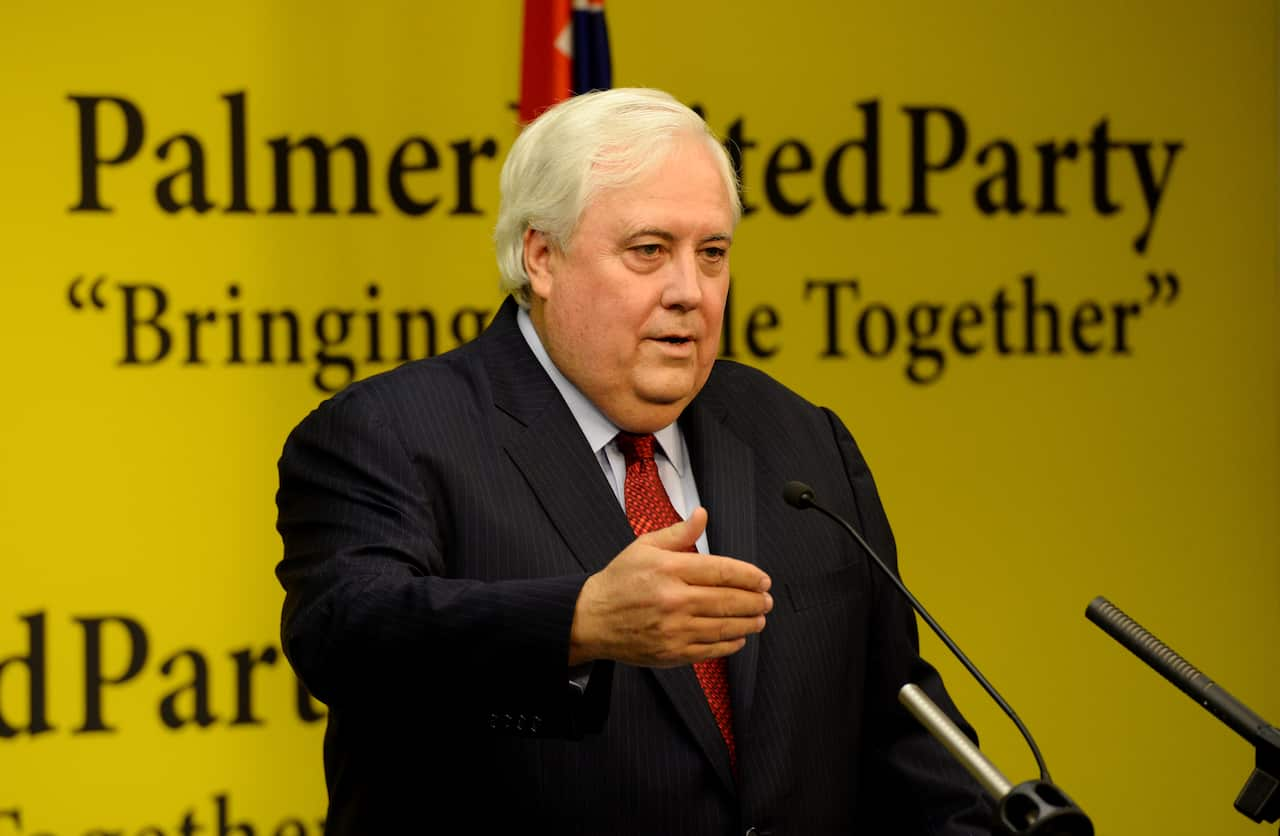 A man stands at a lectern