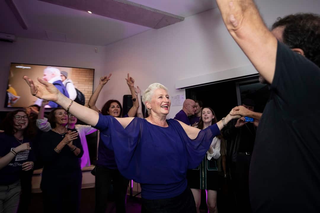 Dr Kerryn Phelps celebrates after winning the seat of Wentworth at the North Bondi Surf Lifesaving Club.