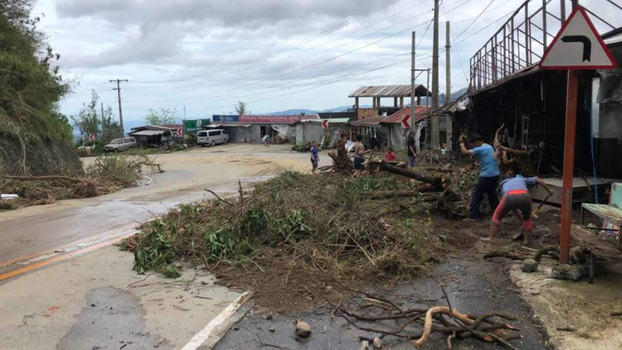 Benguet province: Roads are being cleared after the typhoon.