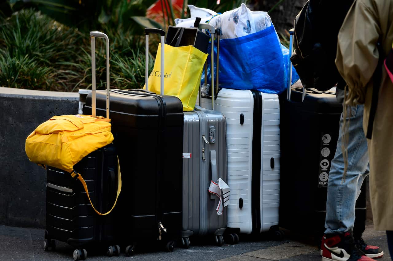 Resident's luggage outside the Mascot Towers building in Mascot, Sydney.
