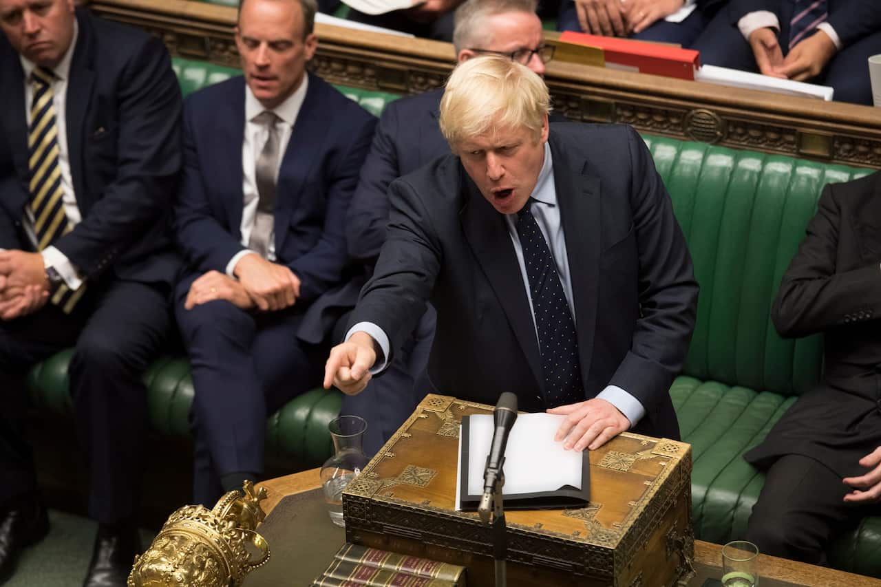 British Prime Minister Boris Johnson gesturing during a dramatic session in the House of Commons