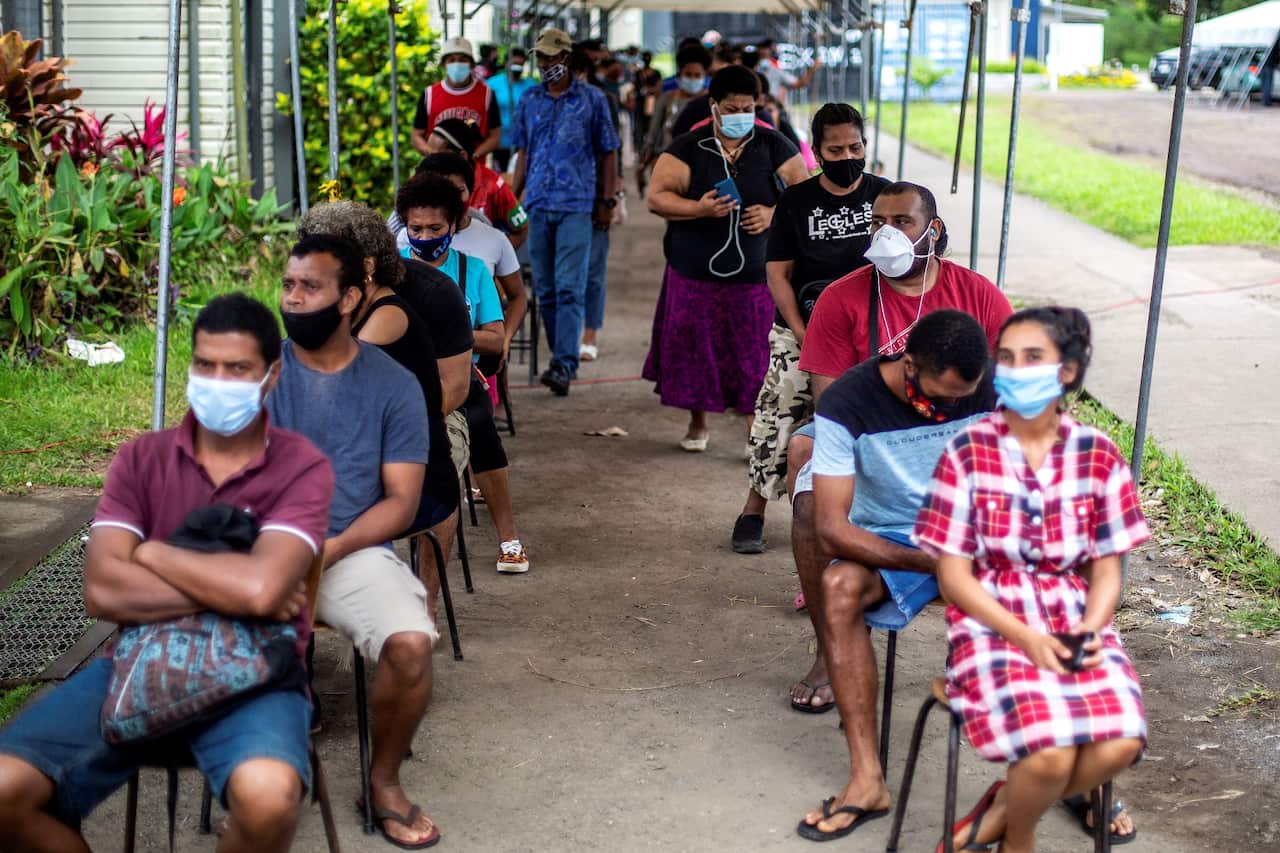 Residents wait for their dose of AstraZeneca vaccine in Suva 