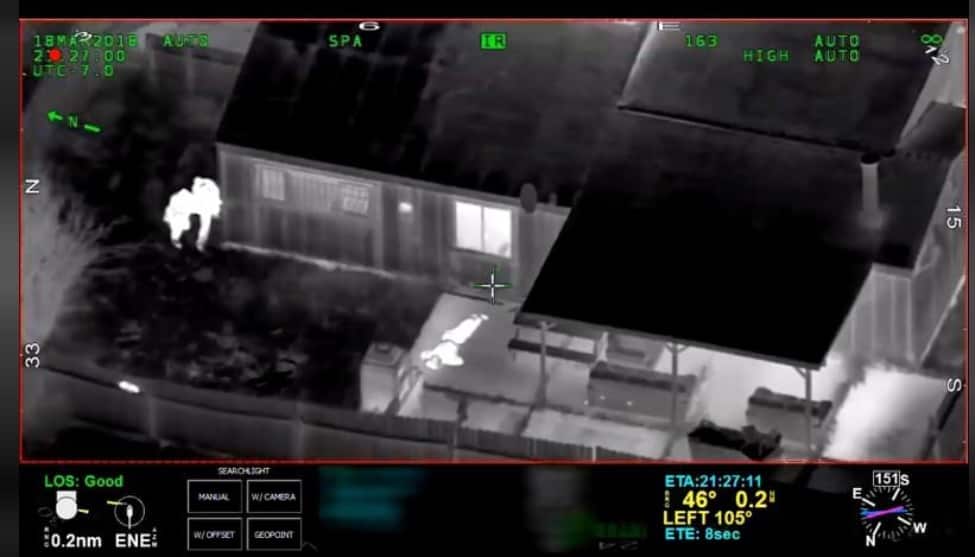 Sceenshot from the footage showing the police officers shooting the man 