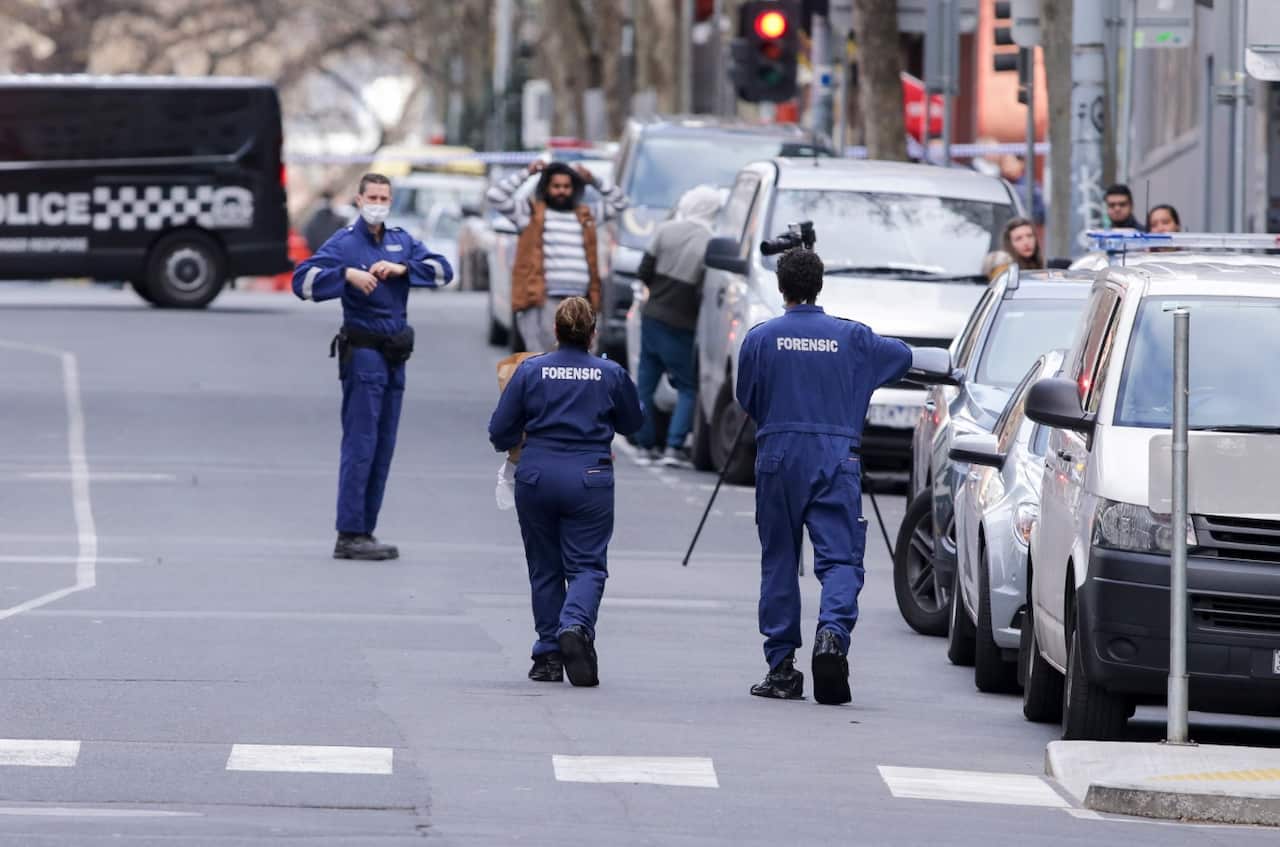 Police investigate a crime scene at the EQ Arcade building on A'Beckett Street in Melbourne, Saturday, July 21, 2018.