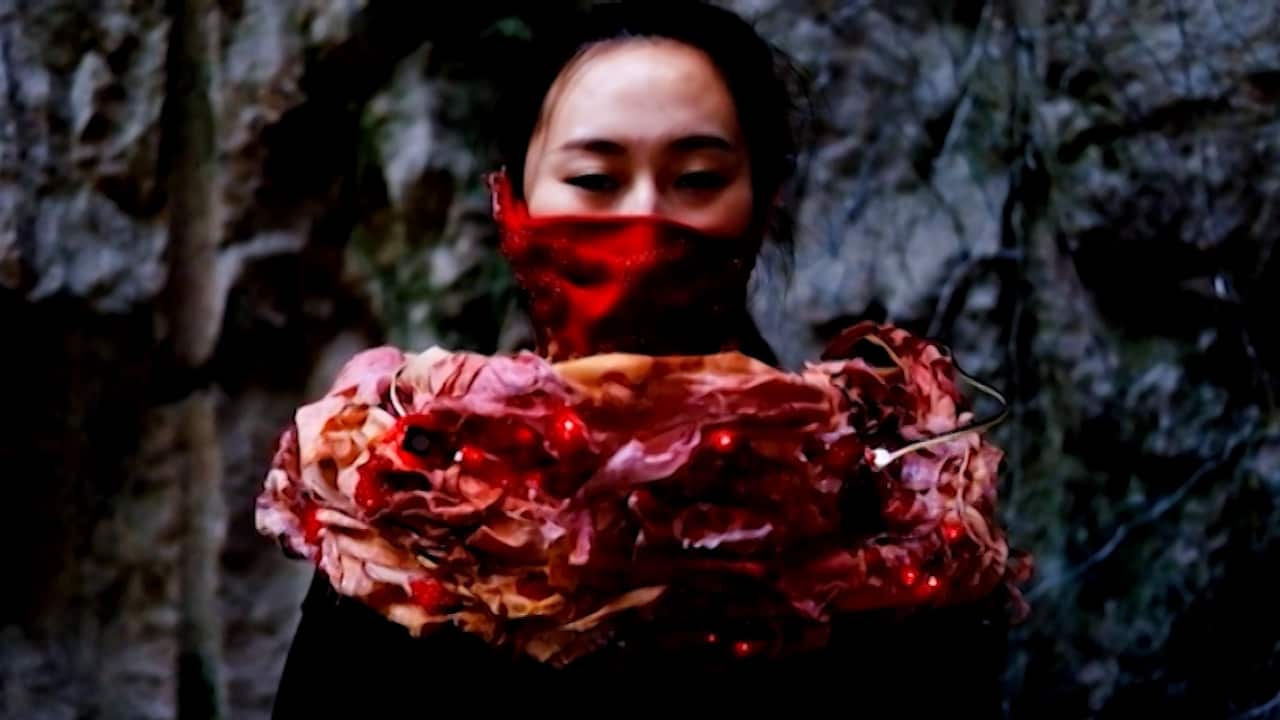 The scarf protects its wearer from smog.