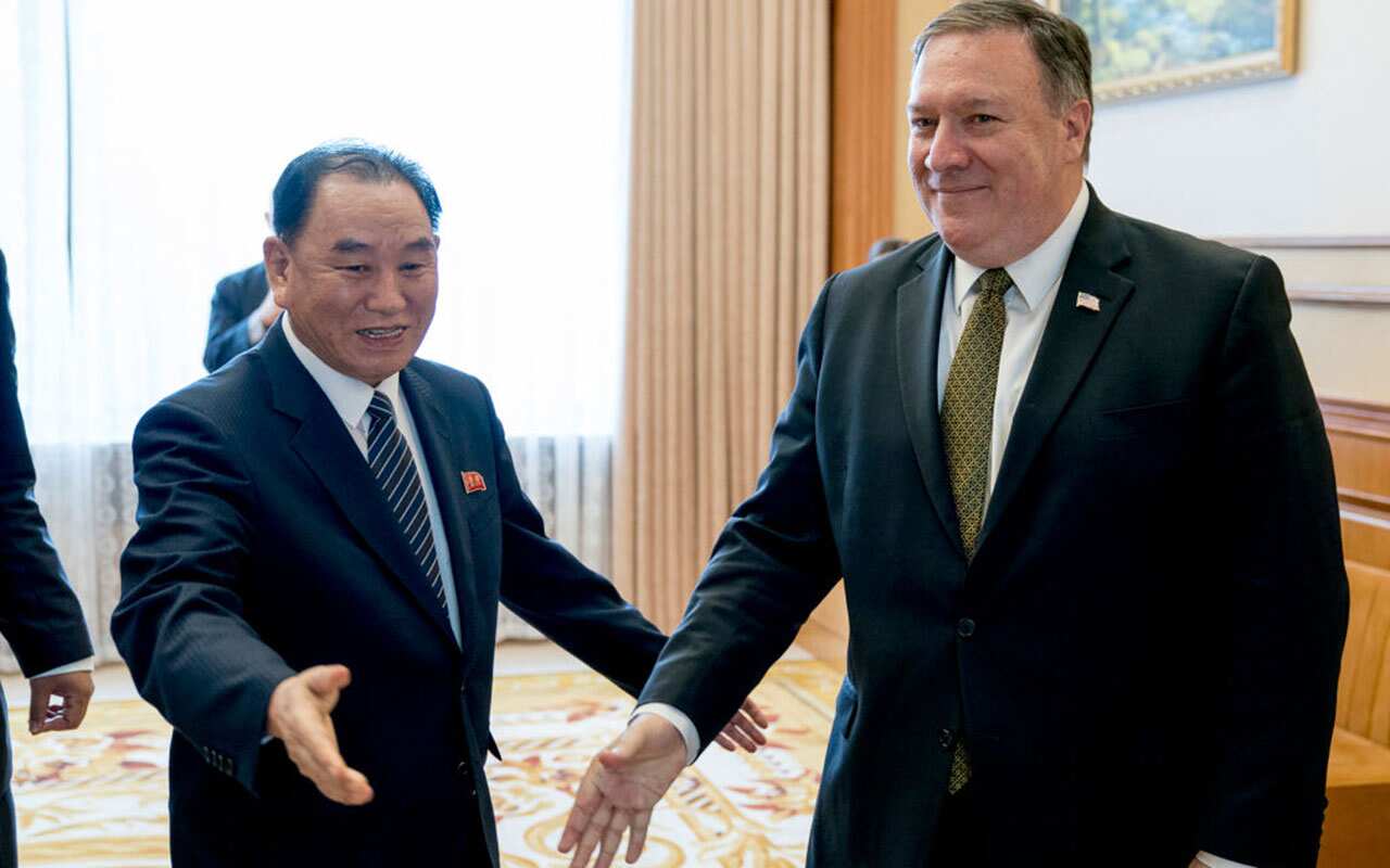 US Secretary of State Mike Pompeo (R) and Kim Yong Chol (L),
