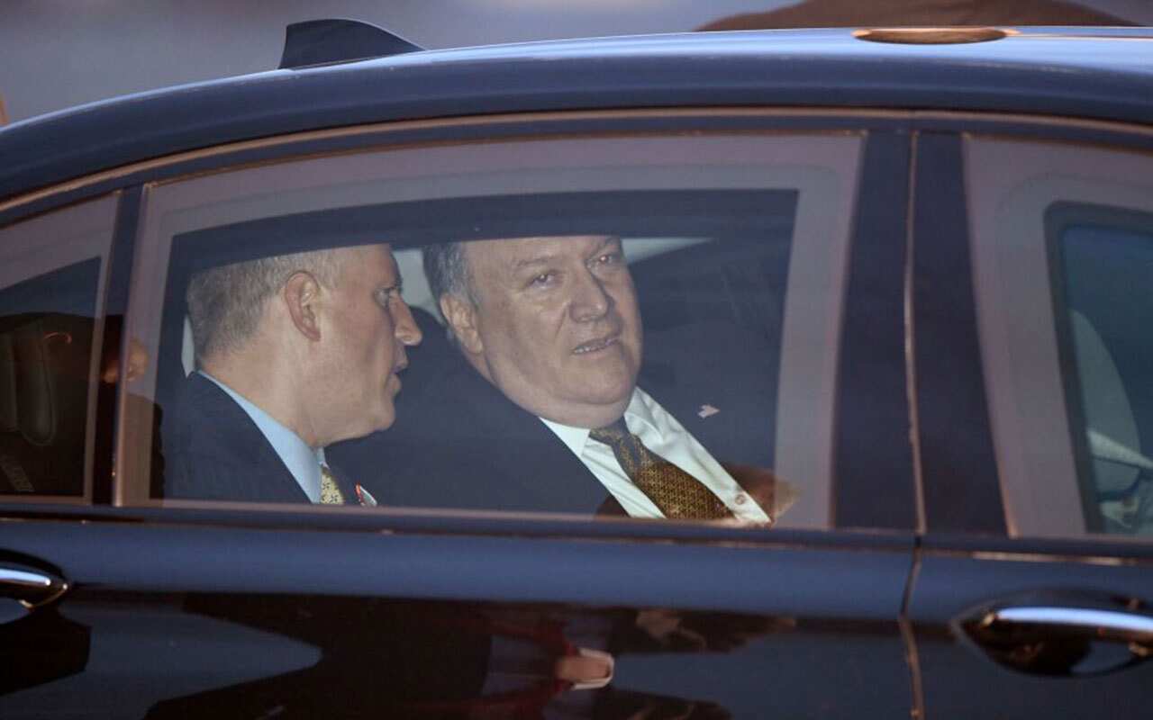 US Secretary of State Mike Pompeo (R) arrives at Tokyo's Haneda Airport on July 7, 2018.