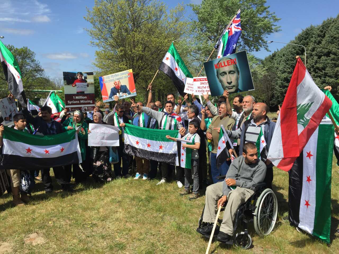 Protesters outside the Russian embassy in Canberra.