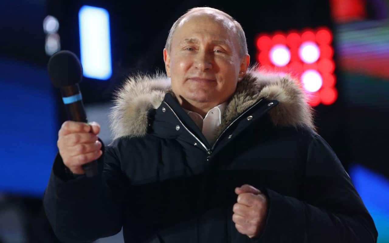 Russian President Vladimir Putin attends a rally of his supporters at Manezhnaya Square near the Moscow's Kremlin, Russia, March 18, 2018.