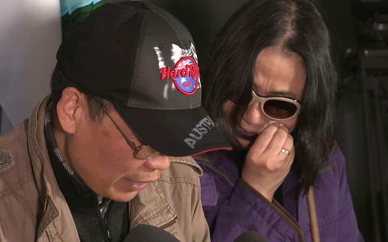 In a raw and emotional press conference, Ms Yu's mother Qing He broke down as she handed out photos of her daughter.