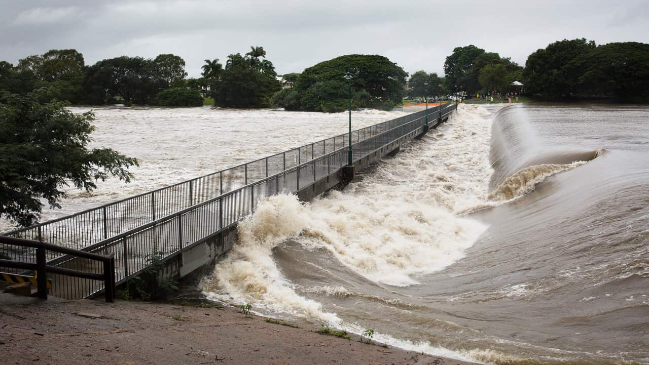 Floodwaters are seen at Aplins Weir in Townsville.