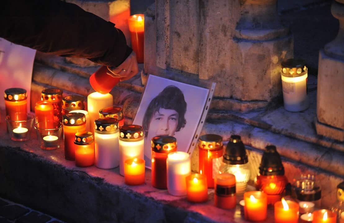 Mourners light candles in commemoration of journalist Jan Kuciak and his girlfriend.