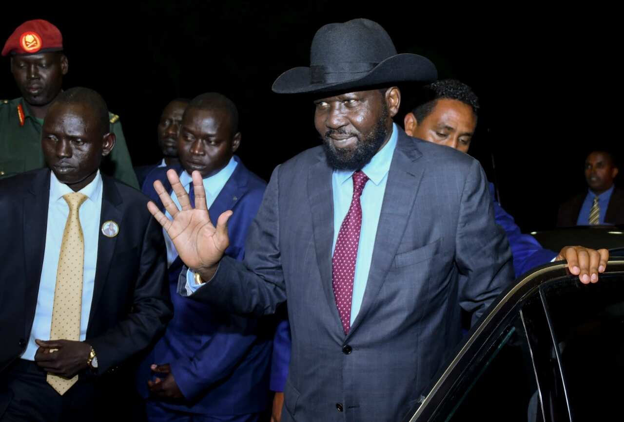 South Sudanese President Salva Kiir gestures as he arrives for the meeting with his rival and the rebel leader Riek Machar in Addis Ababa, Ethiopia