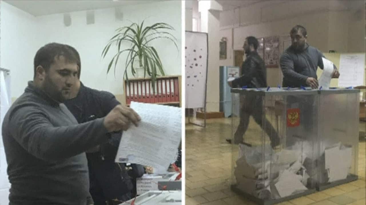 A voter photographed casting a ballot at two seperate polling stations. 