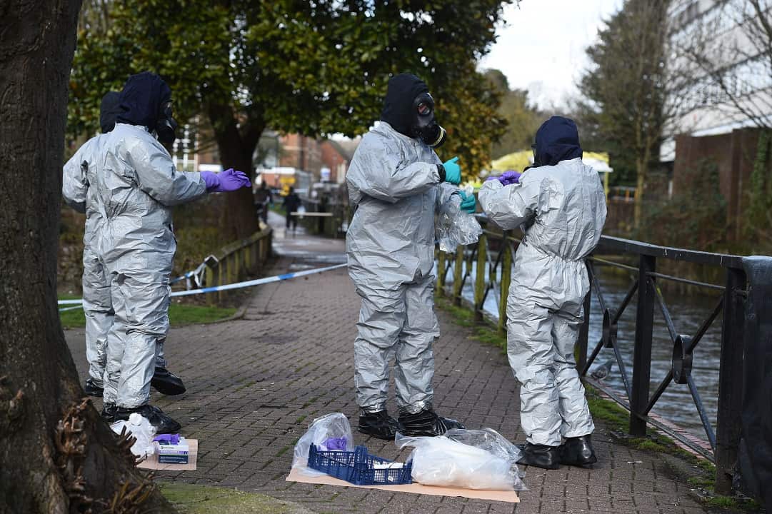 Police bag up swabs from railings where former Russian double agent Sergei Skripal and his daughter were found critically ill.