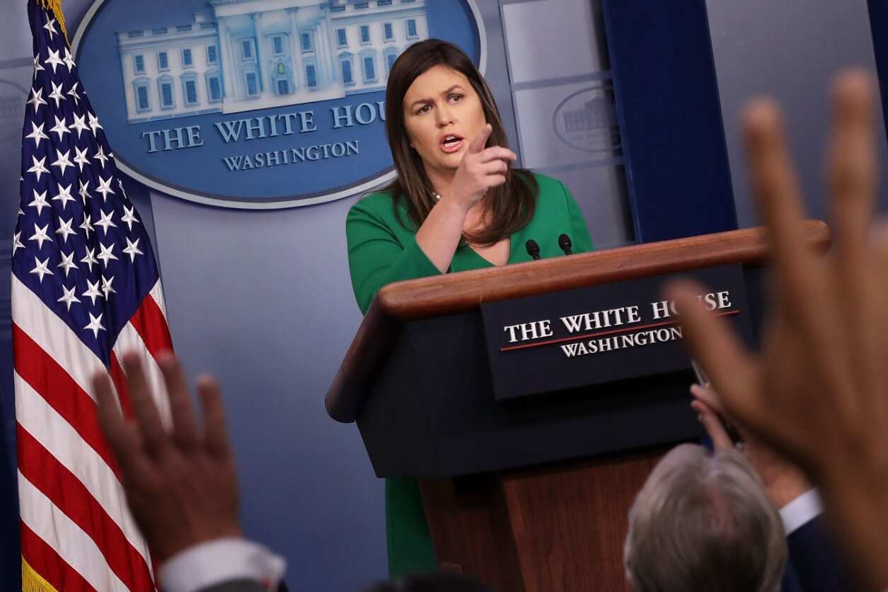 White House Press Secretary Sarah Huckabee Sanders called on reporters during a news conference in the Brady Press Briefing Room at the White House August 15