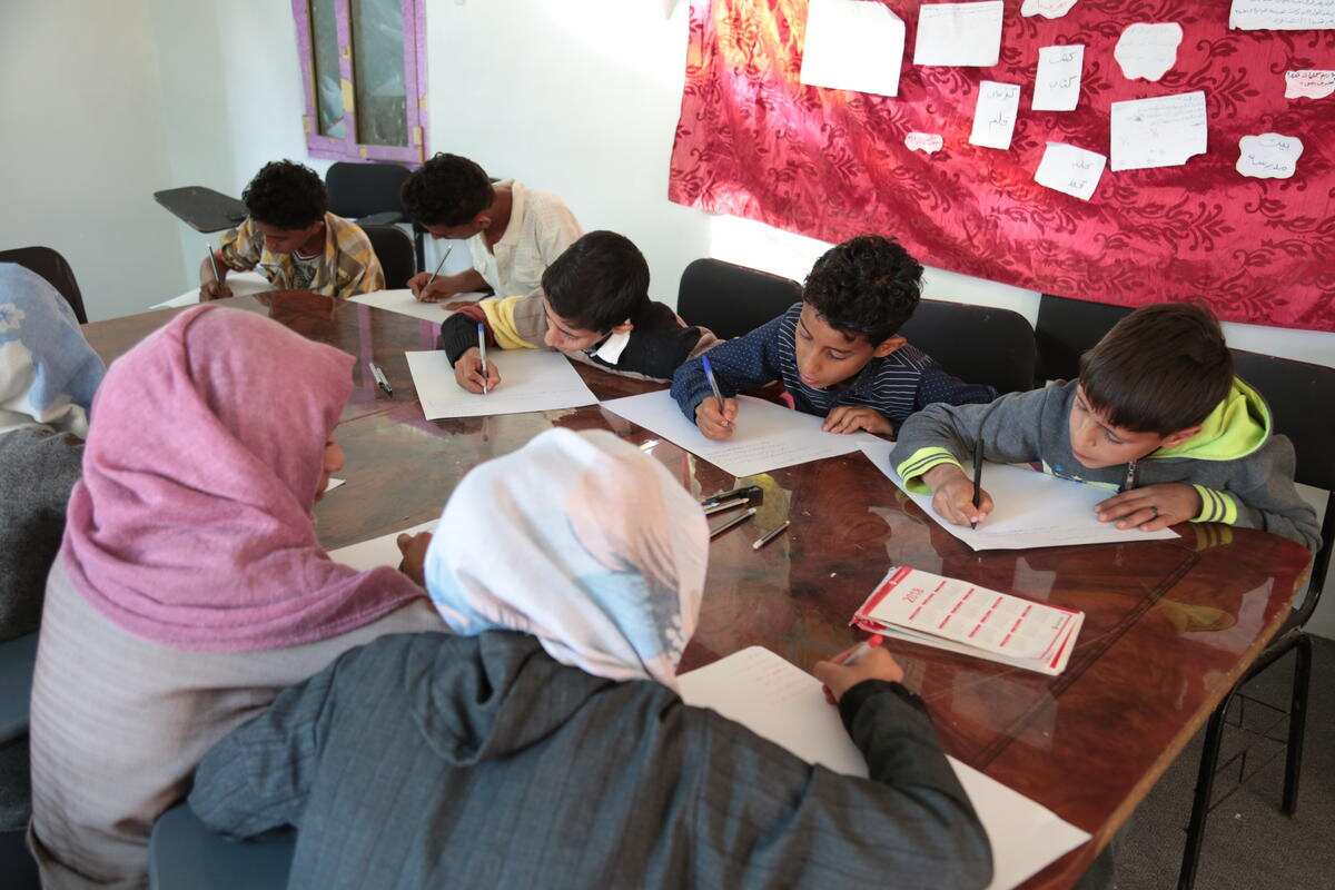 Children at a Child Friendly Space in Sana'a drafting a resolution for the war in Yemen.