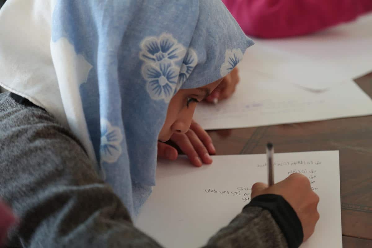Children at a Child Friendly Space in Sana'a drafting a resolution for the war in Yemen/