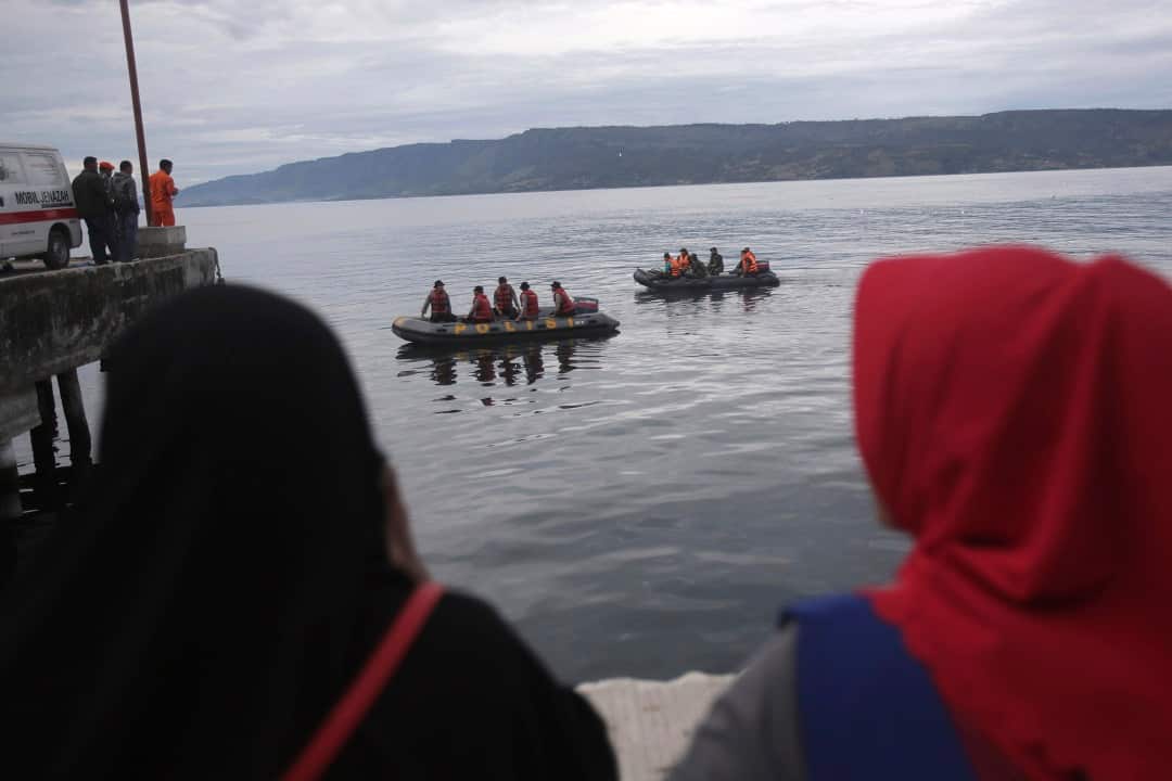 Indonesia search and rescue team on boat  searches for a ferry which sank Monday.
