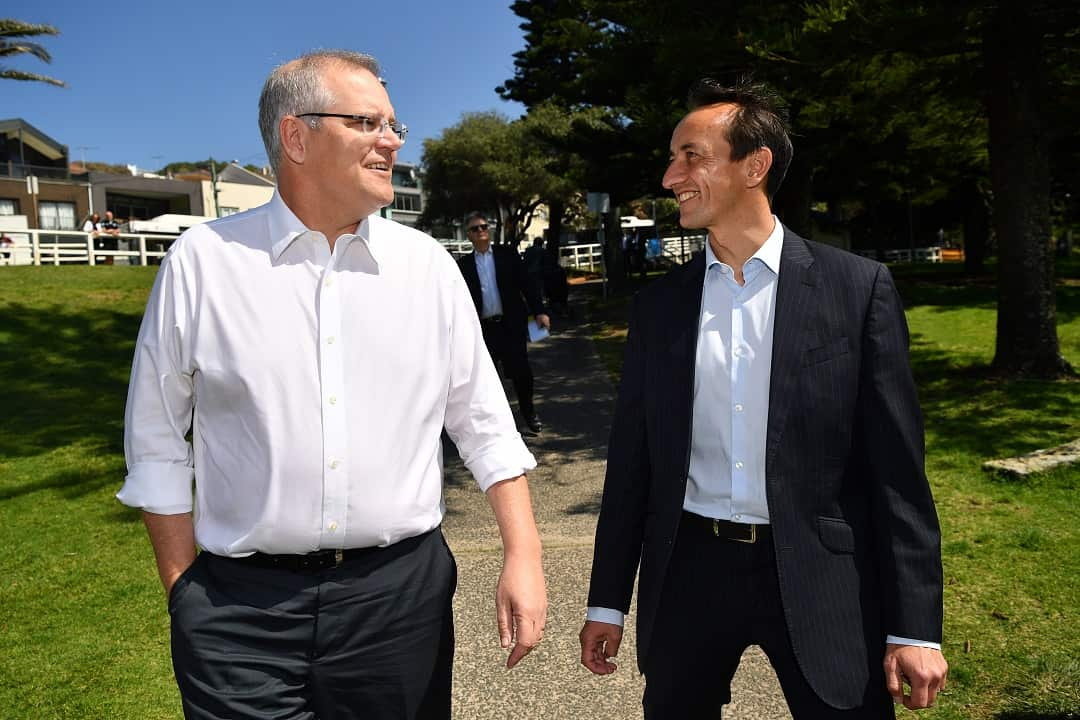 Prime Minister Scott Morrison and Liberal Party candidate for Wentworth Dave Sharma (right) during a visit to Bronte Beach in Sydney, Friday, September 14, 2018. (AAP Image/Joel Carrett) NO ARCHIVING