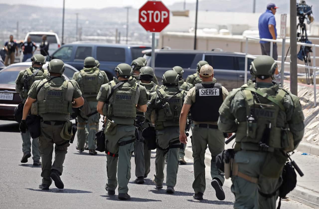 Police officers respond to a shooting incident at a Walmart in El Paso, Texas, USA, 03 August 2019.