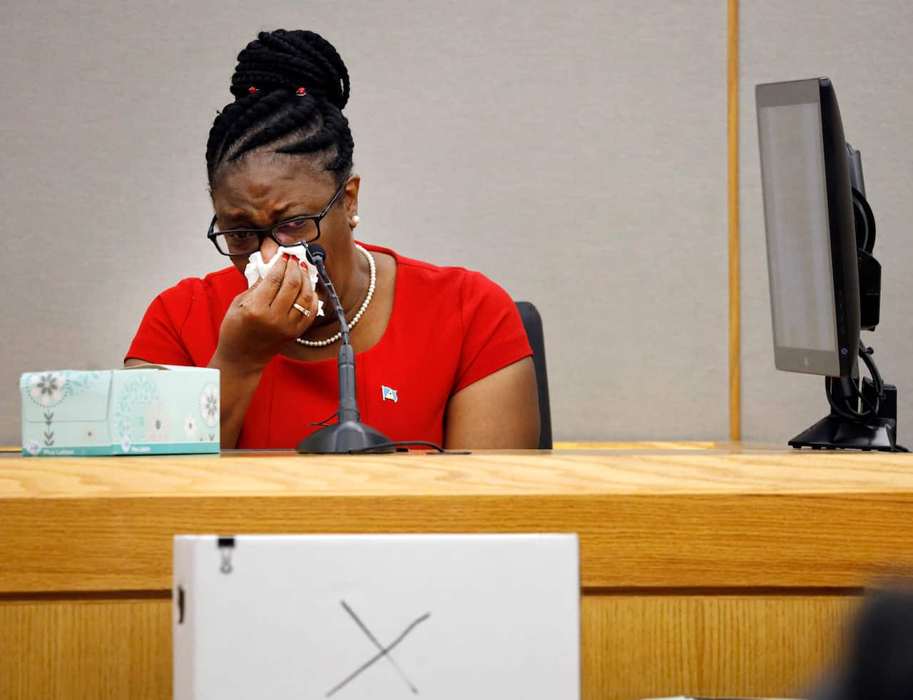 Botham Jean's mother, Allison Jean, becomes emotional speaking about her son during sentencing testimony.