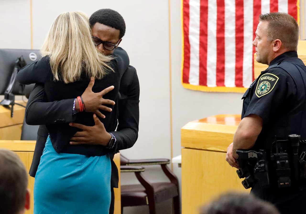Botham Jean's younger brother Brandt Jean hugs convicted murderer Amber Guyger after she was sentenced.