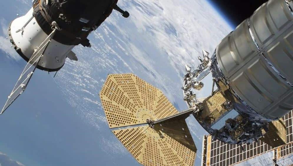 The Russian Soyuz MS-09 crew craft and the Northrop Grumman Cygnus space freighter attached to the International Space Station.