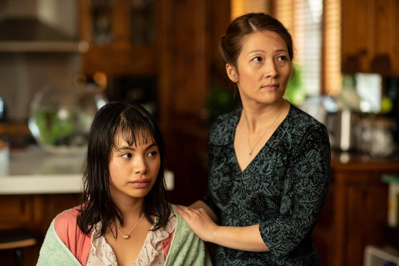 Jillian Nguyen in Hungry Ghosts, alongside her on-screen mother, Oakley Kwon.