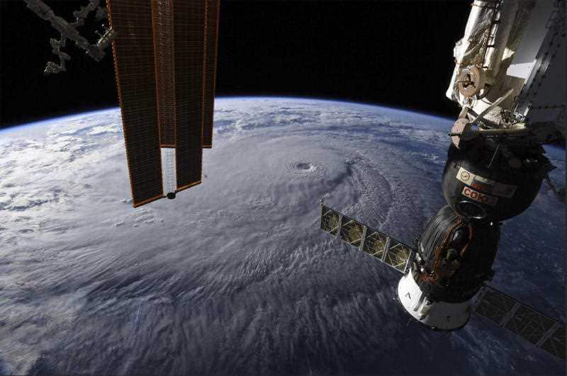 The Russian Soyuz MS-09 crew craft, left, and the Northrop Grumman Cygnus space freighter attached to the International Space Station.