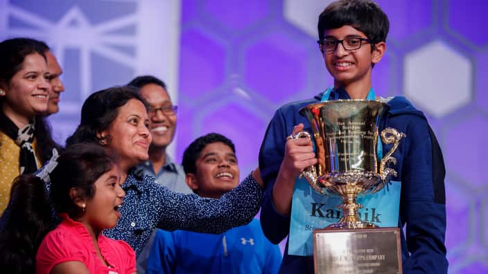 Karthik Nemmani with the championship trophy.