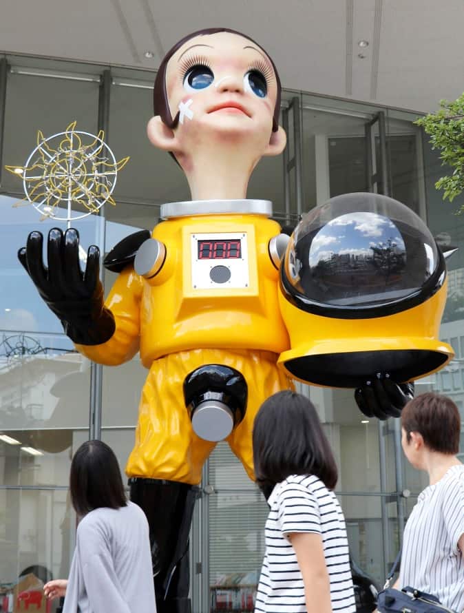 The artwork 'Sun Child' by Japanese artist Kenji Yanobe is displayed before a cultural facility in Fukushima city, Japan, 14 August 2018. 