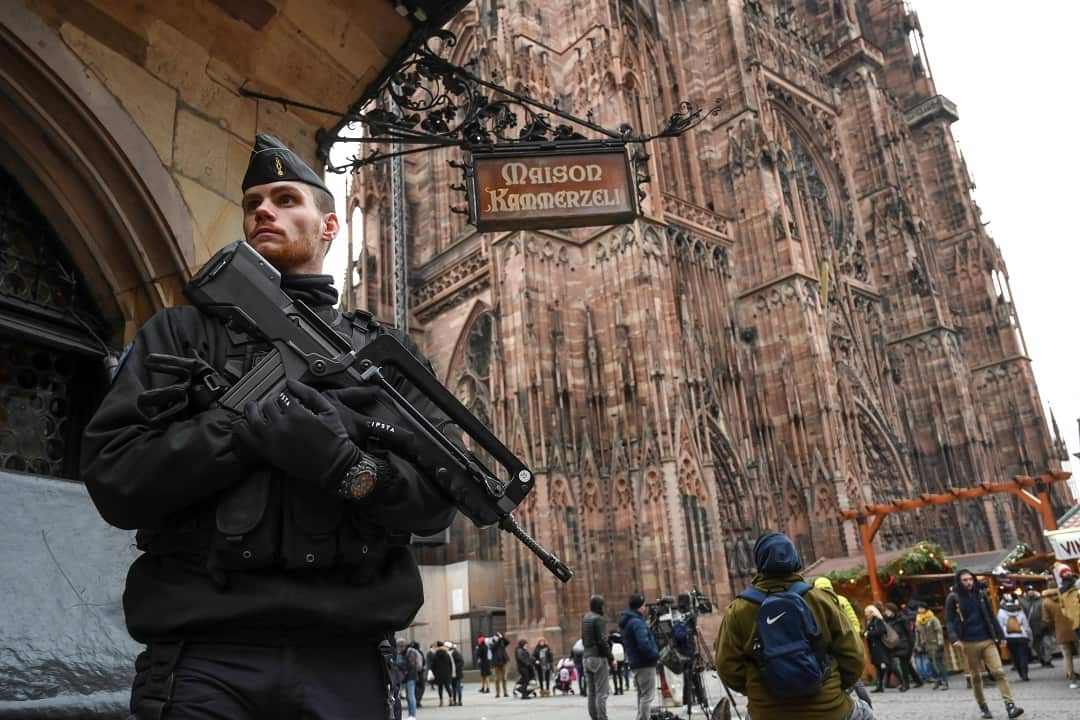 The Christmas market has reopened but the security presence still remains.