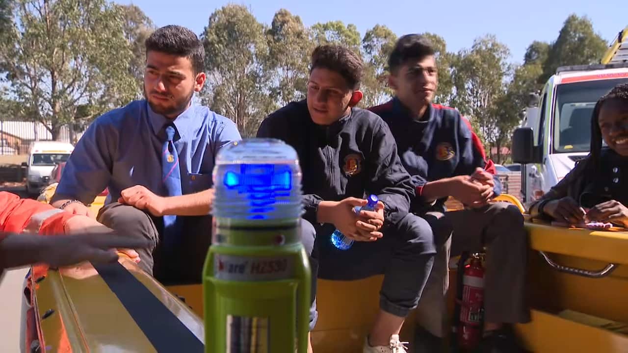 Students being taught about the SES