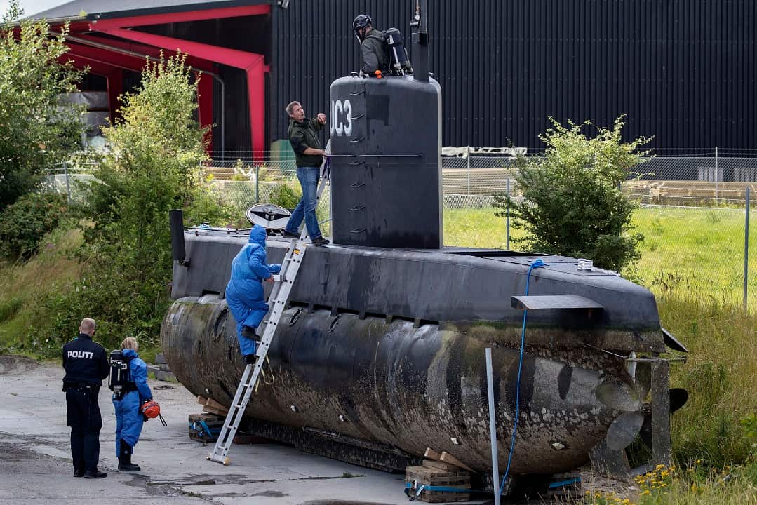 August 13, 2017: Forensic technicians examine Peter Madsen's submarine UC3 Nautilus.