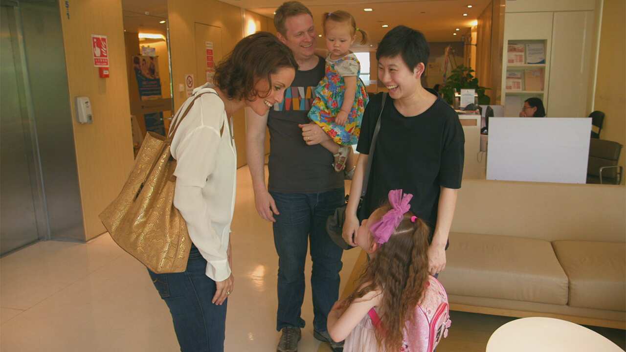 Aela (left) with Assistant Producer Kitty Bu and her family.
